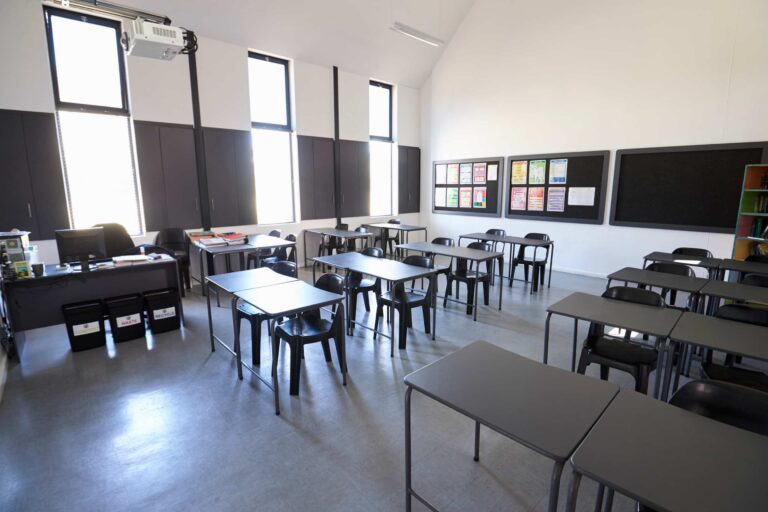 sunlit-modern-elementary-school-classroom-2024-10-19-12-26-36-utc (1)